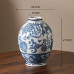 vase porcelaine chinois blanc bleu fleurs feuilles oiseaux géométrique classique floral table decoration