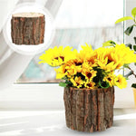 Pot de fleurs en bois avec décor doré et aspect écorce