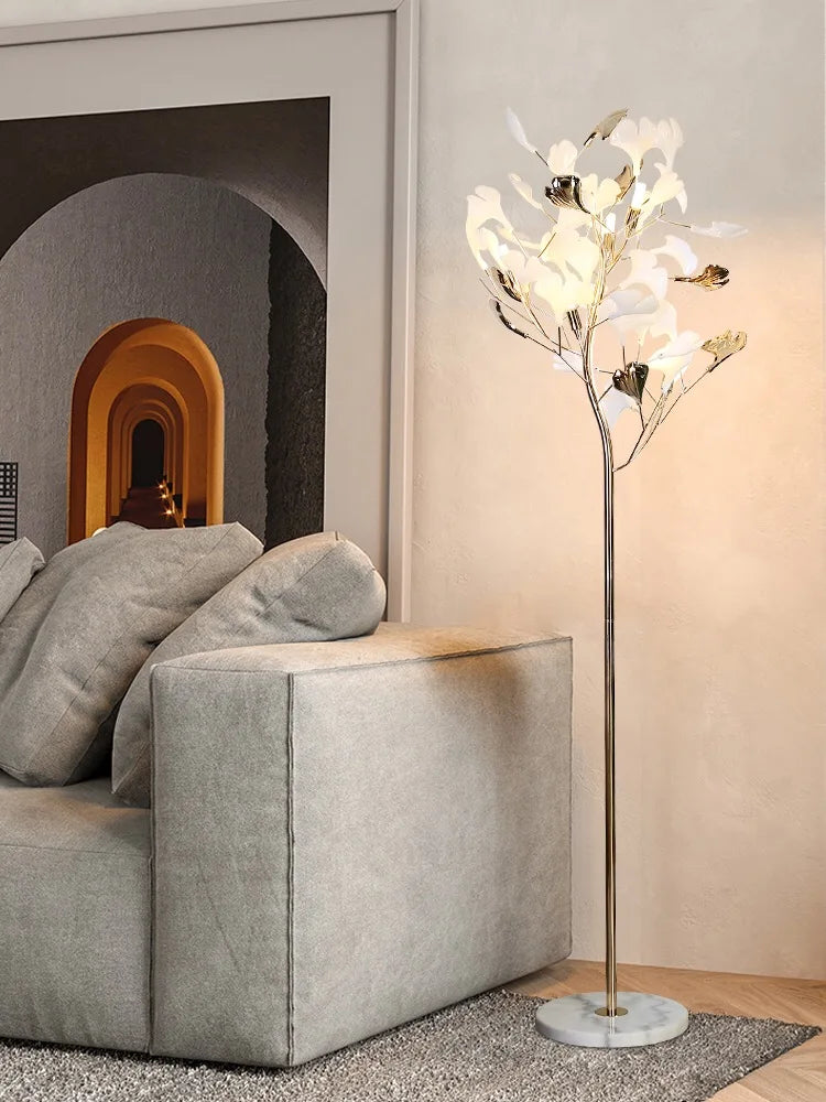 lampe sol contemporaine dorée blanche ampoules led feuilles stylisées élégante intérieure salon chambre