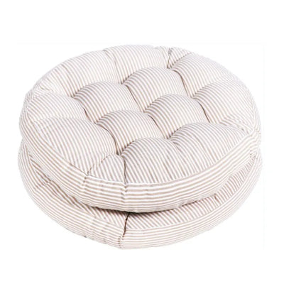 Coussin de sol extérieur rond blanc sur patio en bois