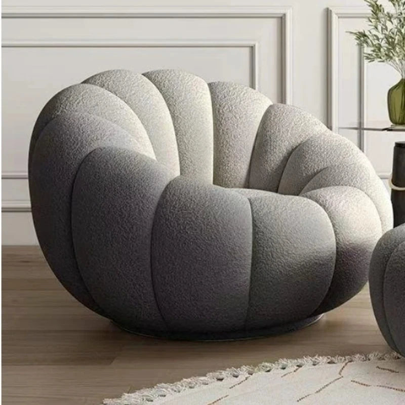 fauteuil moderne velours bouclé doux repos pieds beige clair intérieur meubles salon contemporain