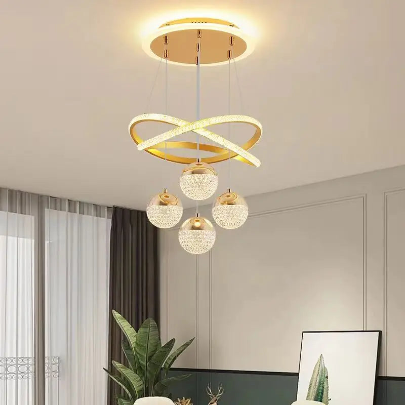 suspension lumineuse moderne or noir anneaux boules translucides led clips