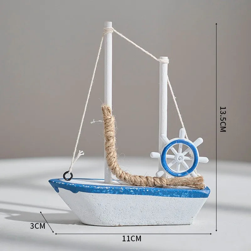 décoration maison bateau voile miniature blanc bleu clair coquillage étoile mer oiseau filet pêche
