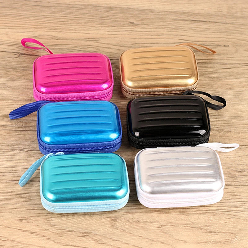 boîte rangement huiles essentielles 15 compartiments bouteilles métal couleurs bleu rose doré moderne pratique