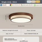 lampe moderne texture bois cristaux dorés noir opacité led tricolore