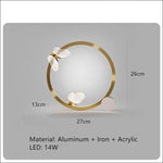 suspension lumineuse contemporaine or blanc papillons relief cercle lumineux opacité translucidité fixations minimalistes chambre