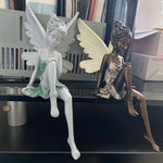 ornement extérieur statue fée assise résine détails floraux blanc marron fantastique