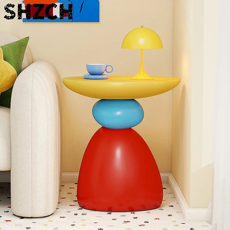 table basse ronde pierre moderne minimaliste sculptural couleur vive salon