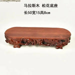 support bonsaï bois sculpté motifs floraux artisanal marron foncé unique présentation plante fleur