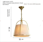 suspension lumineuse or tissu texturé classique chambre salon élégante opaque métal lisse