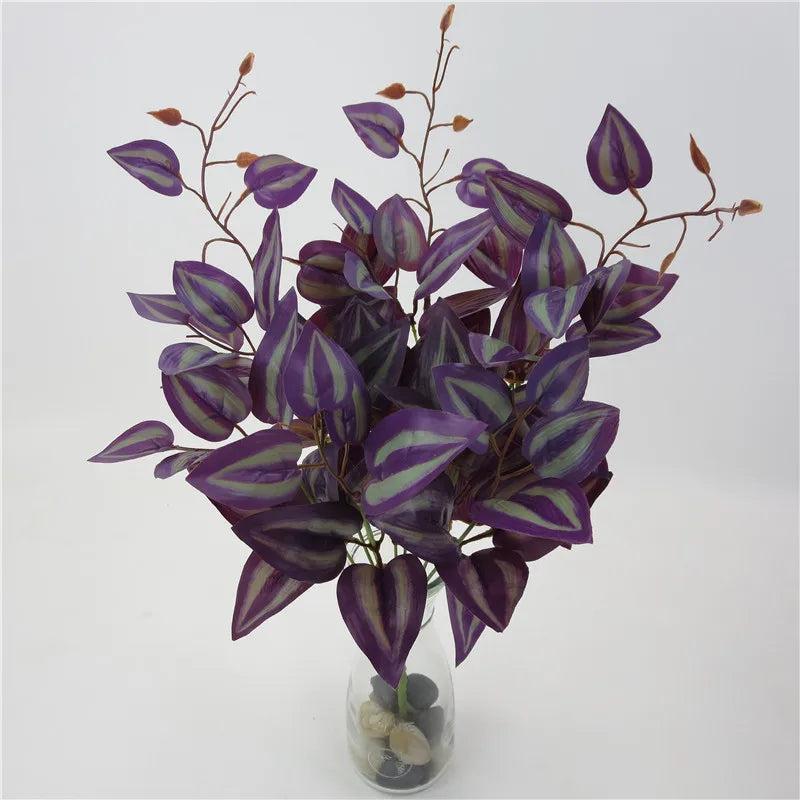 plantes artificielles violet vert marron feuilles ovales moderne décoration extérieure vase galets noirs blancs