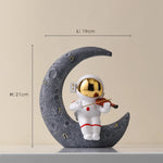 statue astronaute résine saxophone doré guitare violoncelle moderne décoration intérieure chambre salon