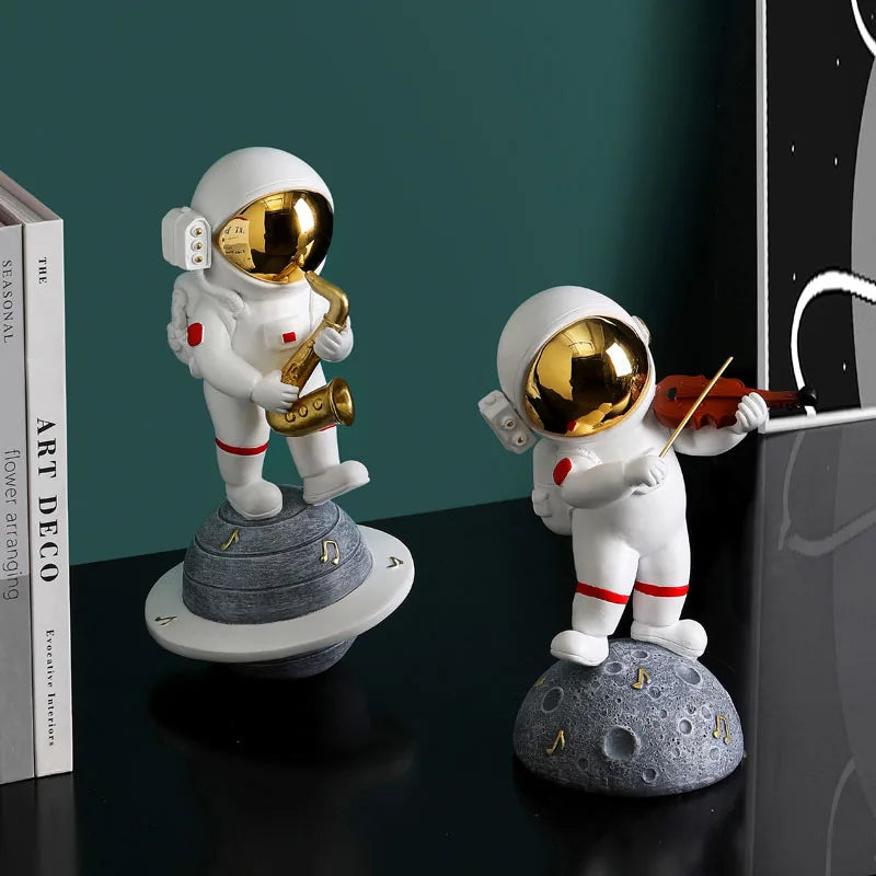 statue astronaute résine saxophone doré guitare violoncelle moderne décoration intérieure chambre salon