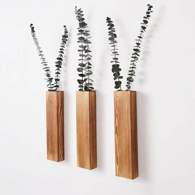 Jardinière murale en bois violette avec plante artificielle