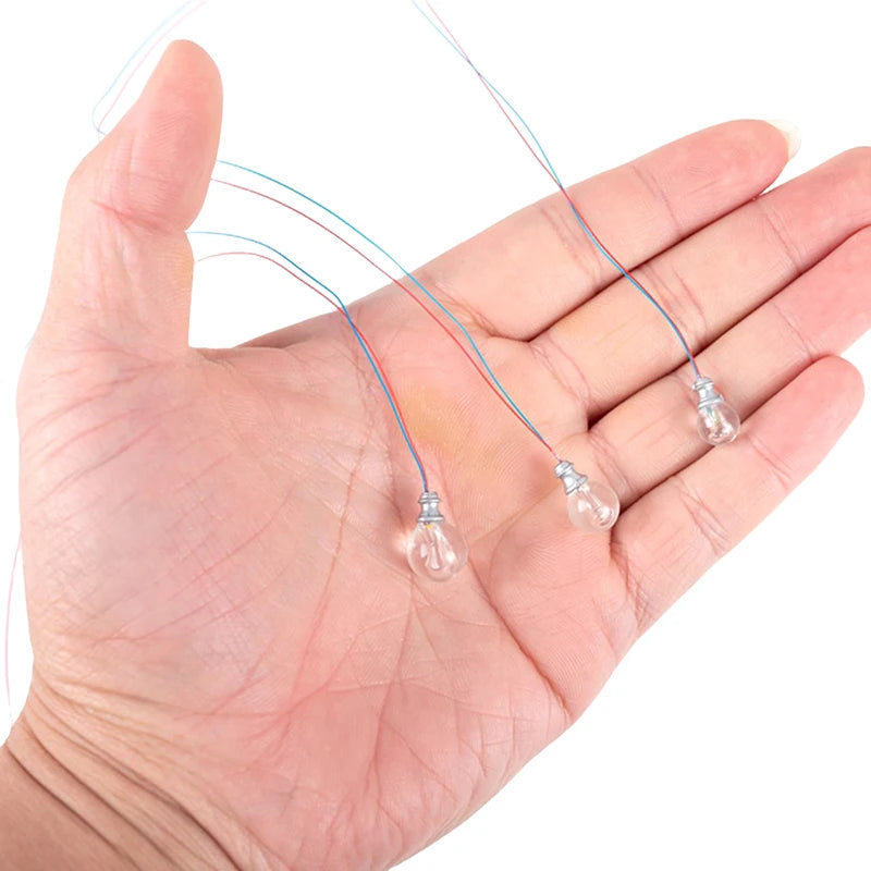 ampoules led transparentes blanc jaune décoration moderne intérieur câbles électriques fixées tringle