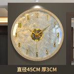 horloge murale moderne or blanc cassé marbre aiguille dorée transparente salon