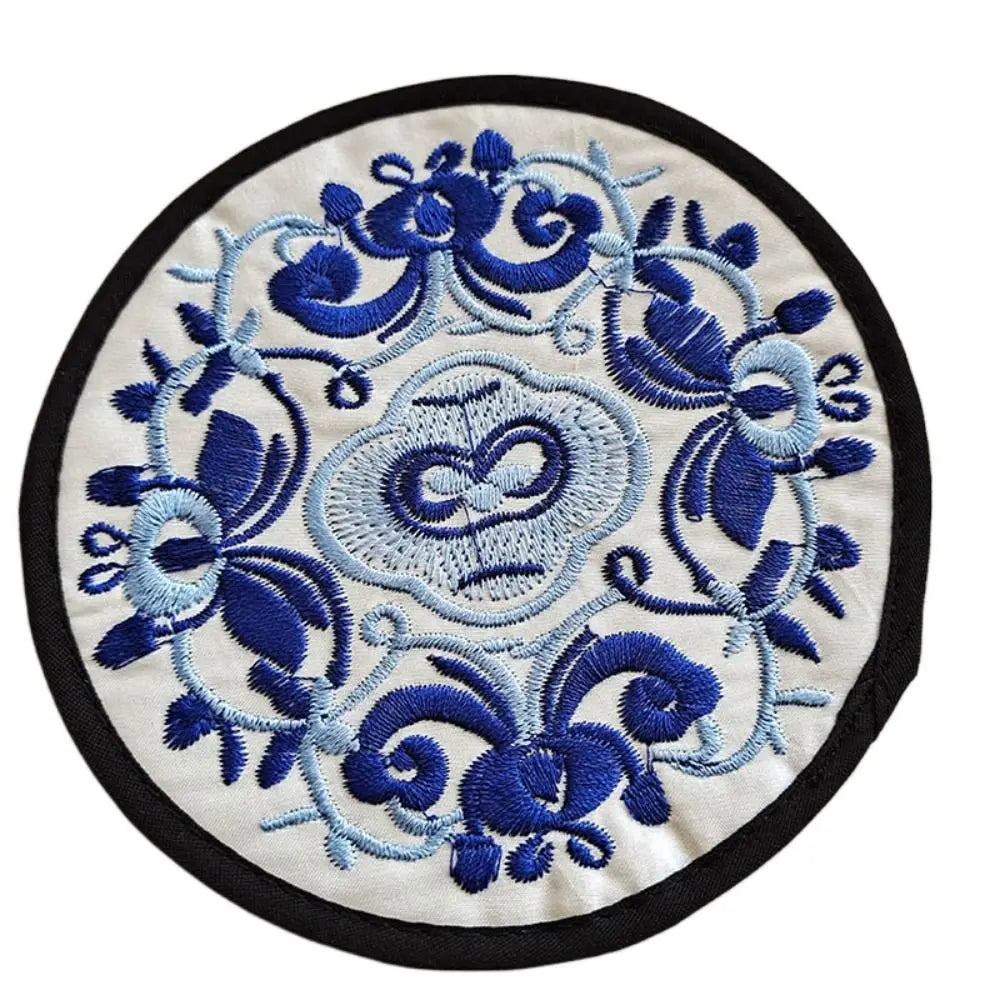 serviettes table traditionnelles broderie florale bleu noir vert rouge jaune rose opaques set table