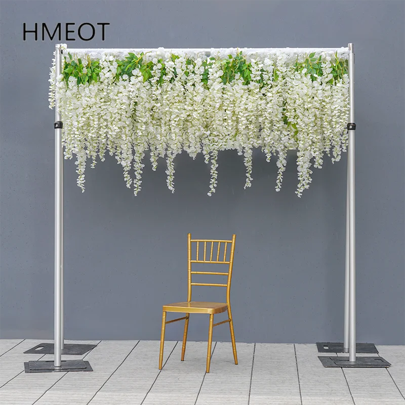 décoration murale fleurs blanches feuilles vertes structure métallique événement mariage anniversaire party moderne