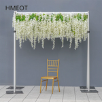 décoration murale fleurs blanches feuilles vertes structure métallique événement mariage anniversaire party moderne