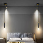 Détail de l'applique murale LED avec projecteur en or et noir