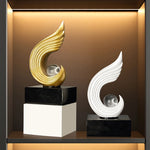 statuettes décoratives modernes or blanc noir spirale sphère transparente minimaliste sculptural