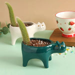 cache pot céramique chat stylisé moderne vert foncé glacé table jardin salon