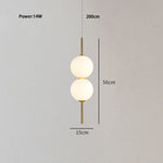 suspension lumineuse moderne blanc doré sphères translucides câble suspendu minimaliste trois leds chambre salon