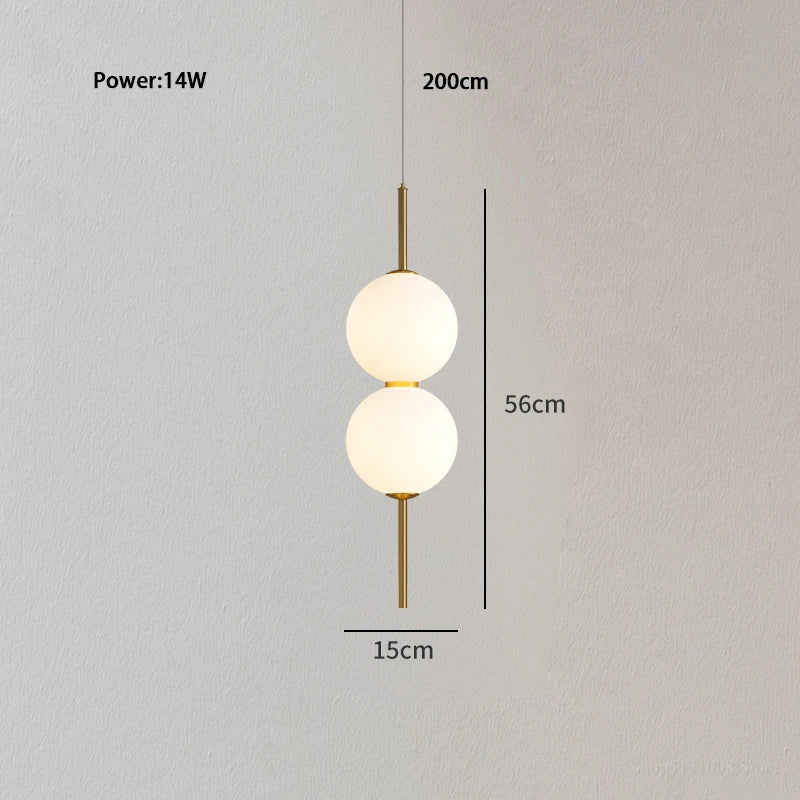 suspension lumineuse moderne blanc doré sphères translucides câble suspendu minimaliste trois leds chambre salon