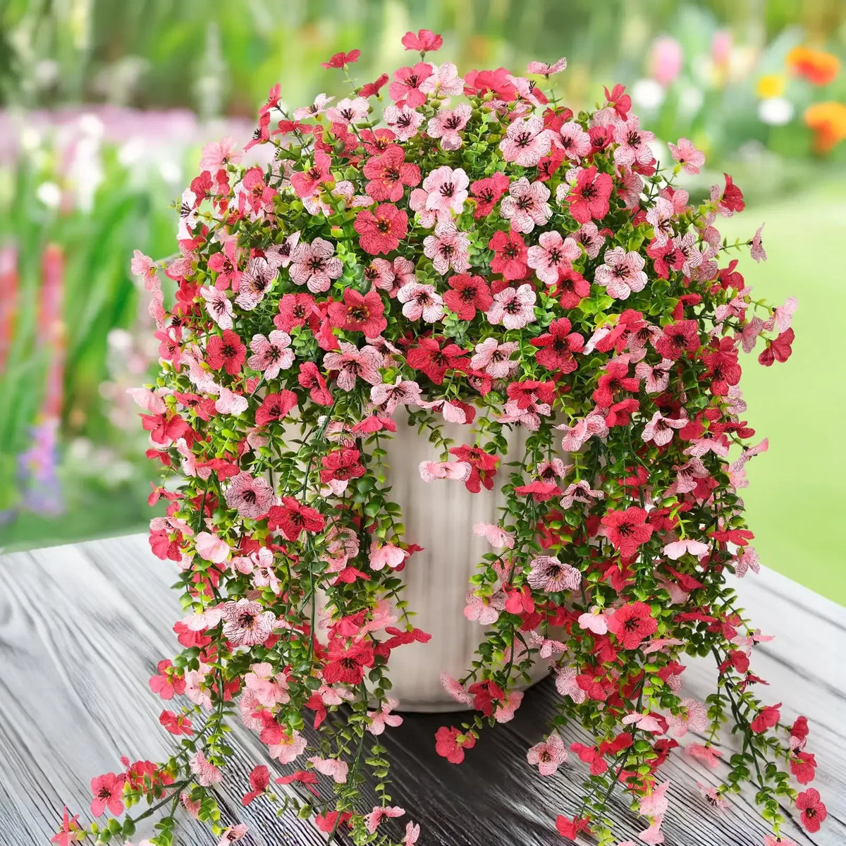 décoration extérieure plante artificielle suspendue fleurs marguerites violettes feuilles vertesbranches flexibles moderne