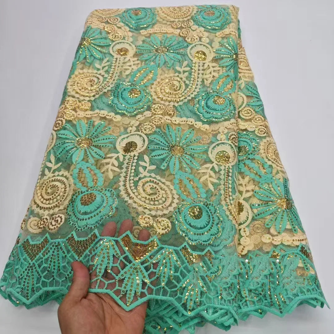 tissu dentelle brodée sequins dorés florals jaune vert rose rouge translucent traditionnel erotique echangiste