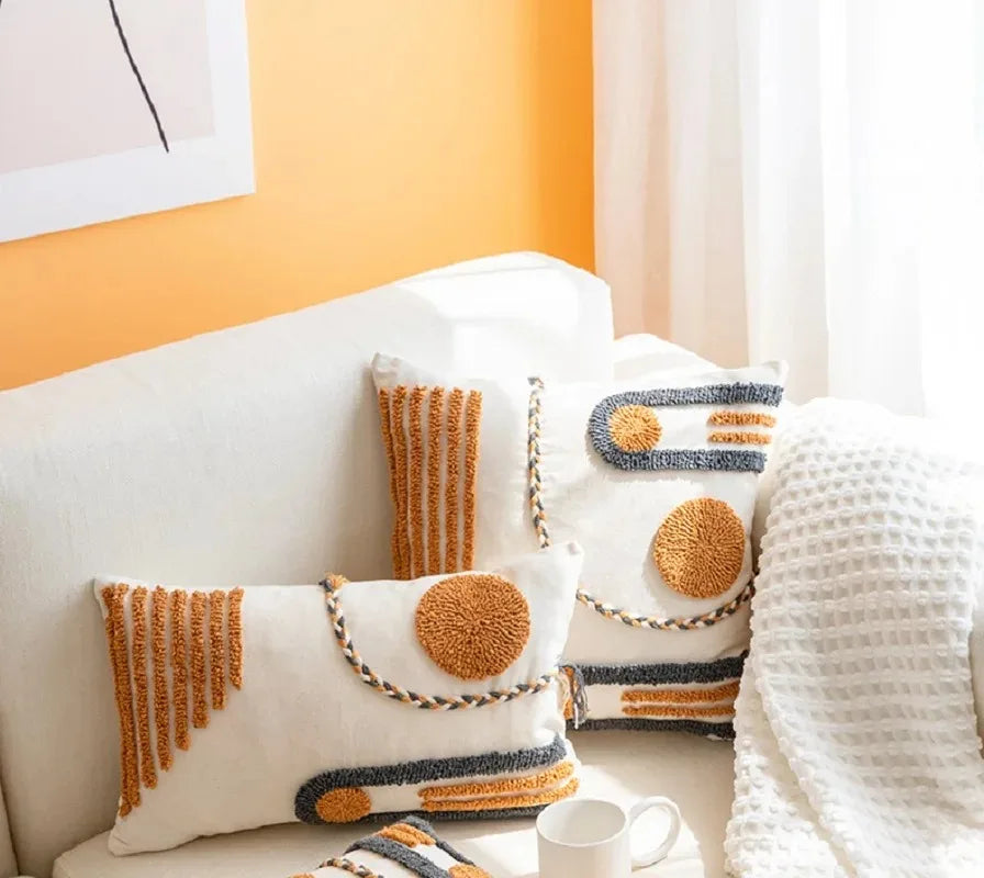 taies d'oreiller géométriques brodées modernes coton polyester blanc orange gris respectueux environnement opaques maison