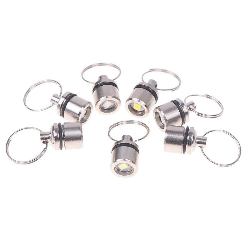 lampe torche argentée moderne compacte anneau rotatif lumineuse rechargeable portable