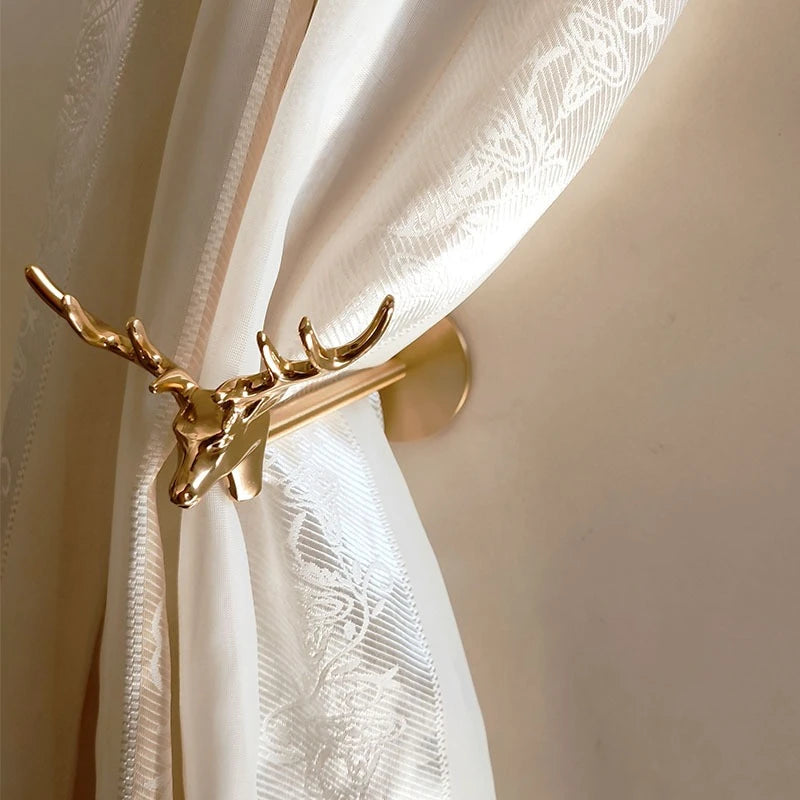 pince rideau dorée oiseau papillon libellule cerf art déco quincaillerie décoration fenêtre fixée