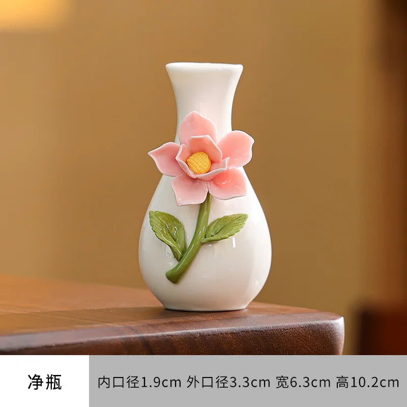 vase décoratif céramique blanche motif fleurs colorées bouquet intérieur moderne