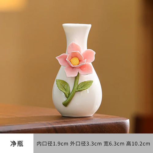 vase décoratif céramique blanche motif fleurs colorées bouquet intérieur moderne