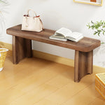 Banc bois marron clair texture naturelle moderne salon tabouret sac main livre ouvert decoration