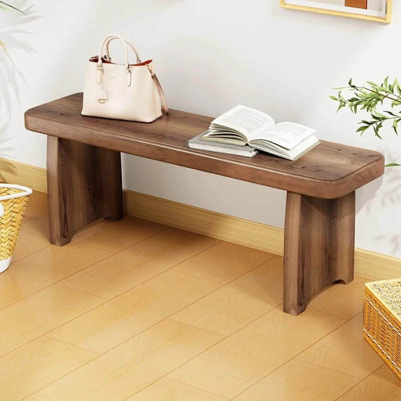 Banc bois marron clair texture naturelle moderne salon tabouret sac main livre ouvert decoration