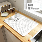 tapis protection table silicone moderne rayures ondulées gris clair blanc