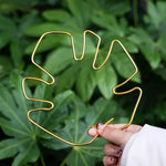 Support plante pot or vert feuille stylisée moderne adhésif