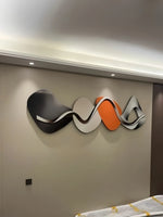 lampe murale moderne abstraite couleurs gris noir orange métallique effets lumineux chambre salon