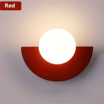 lampes murales modernes blanc rouge noir jaune sphères translucides demi cercles opaques minimaliste