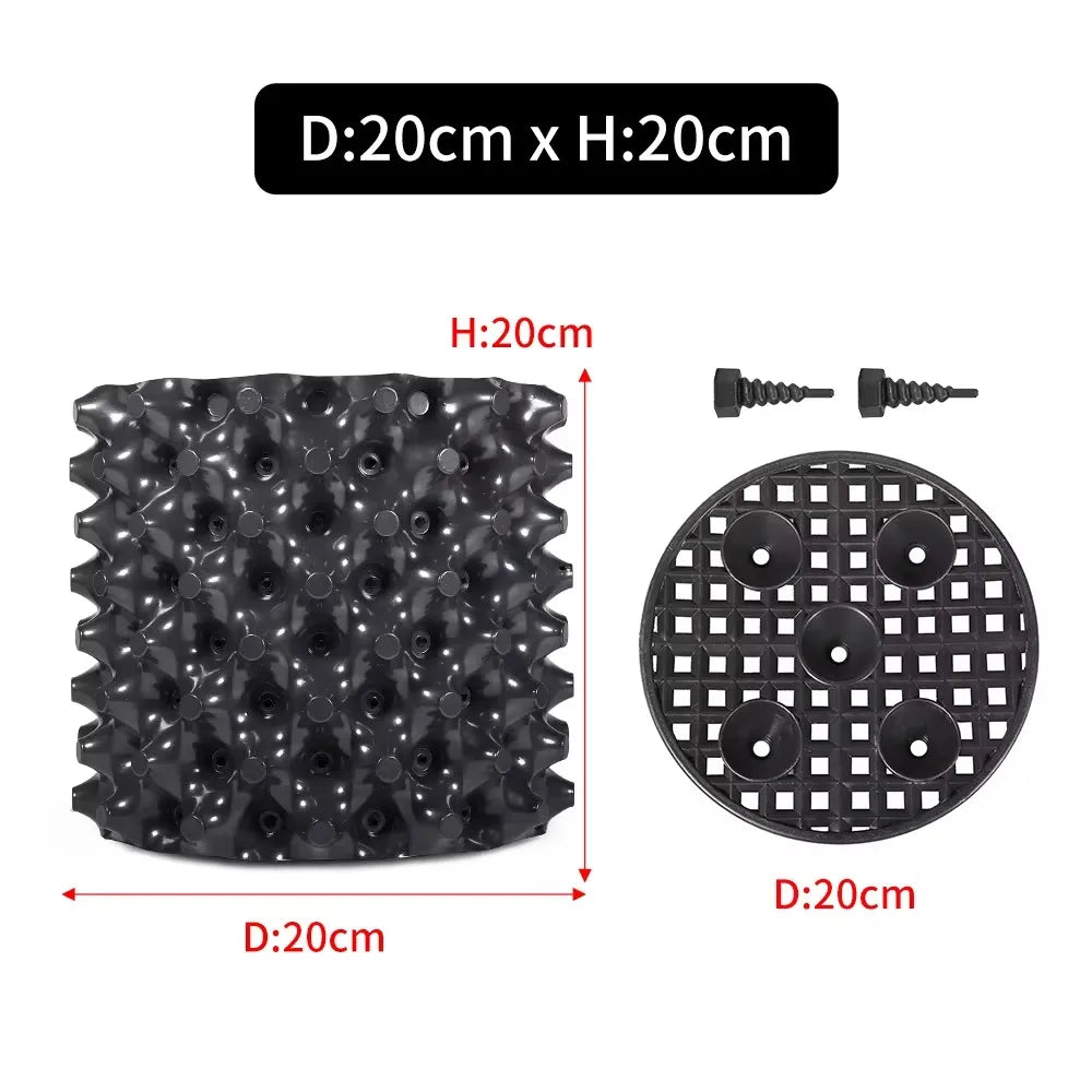 grille drainage plante noir moderne perforations circulaires différentes tailles incluses