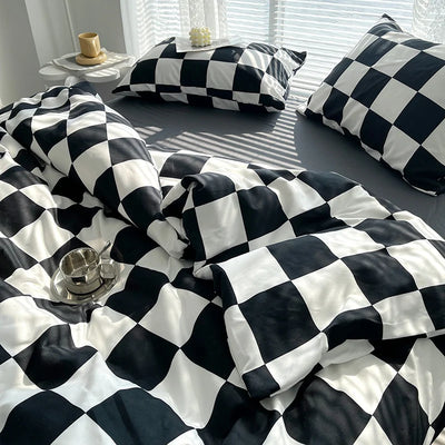 Parure de lit 90x200 élégante à carreaux sur un lit