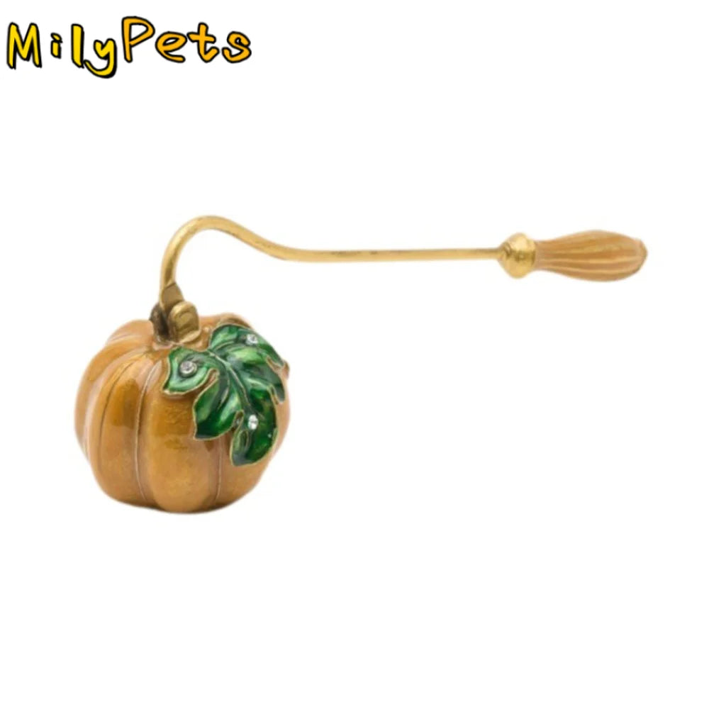 bougie parfumée suspension citrouille classique vintage orange vert bleu doré motifs feuilles tringle