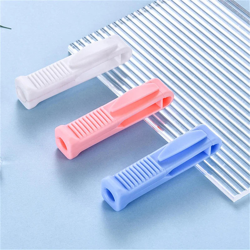 outil déballage ampoules blanc bleu rose rayures verticales pratique ergonomique respectueux environnement