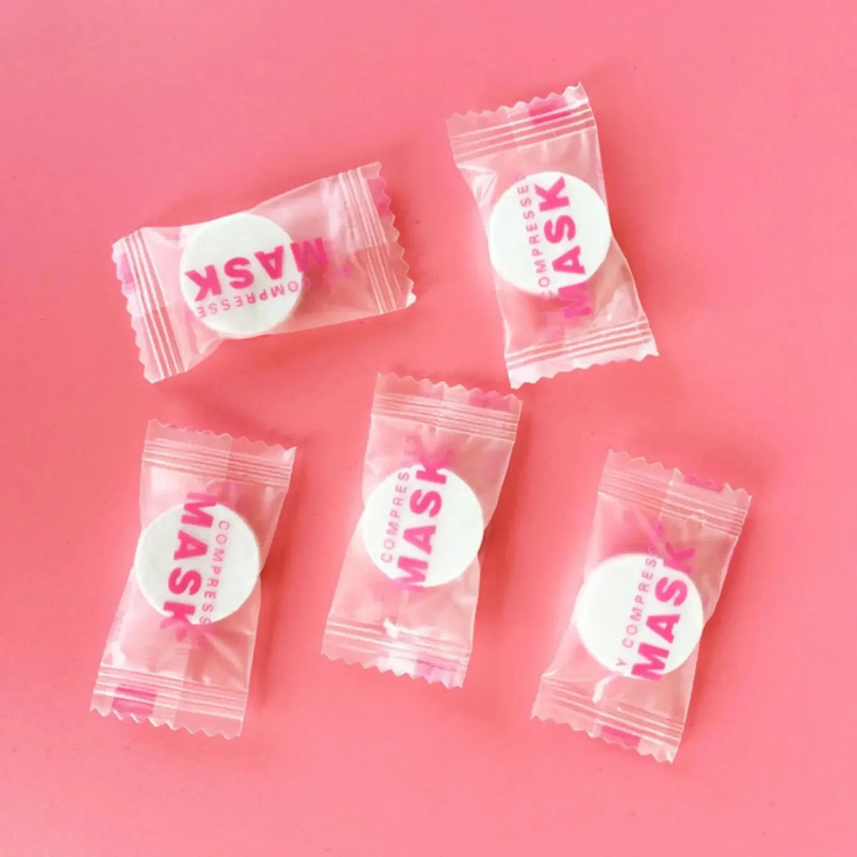 masques faciaux soins peau rose blanc texturés comprimés nettoyage beauté voyage emballages individuels semi