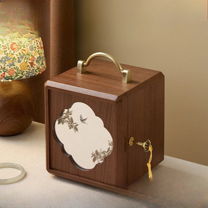 boîte bijoux bois marron foncé vintage ornements floraux poignées dorées rangement bijoux classique