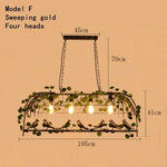 suspension lumineuse vintage oiseaux métal feuilles vert ampoules noir doré rustique