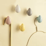 pinces linge modernes formes gouttes couleurs blanches grises roses jaunes bleues brillantes