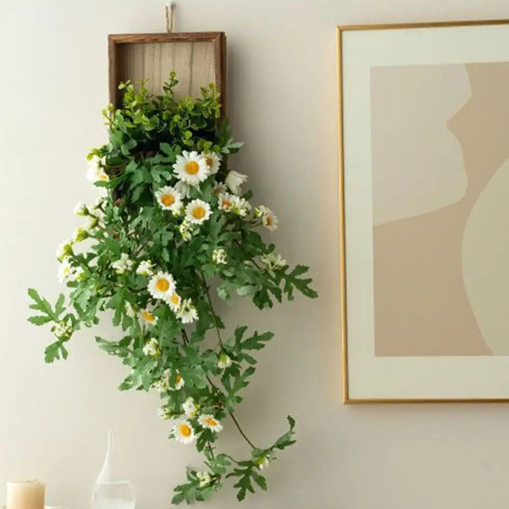 décoration murale plante artificielle suspendue fleurs blanches feuilles vertes crochet mural moderne minimalisteintérieur ambiance